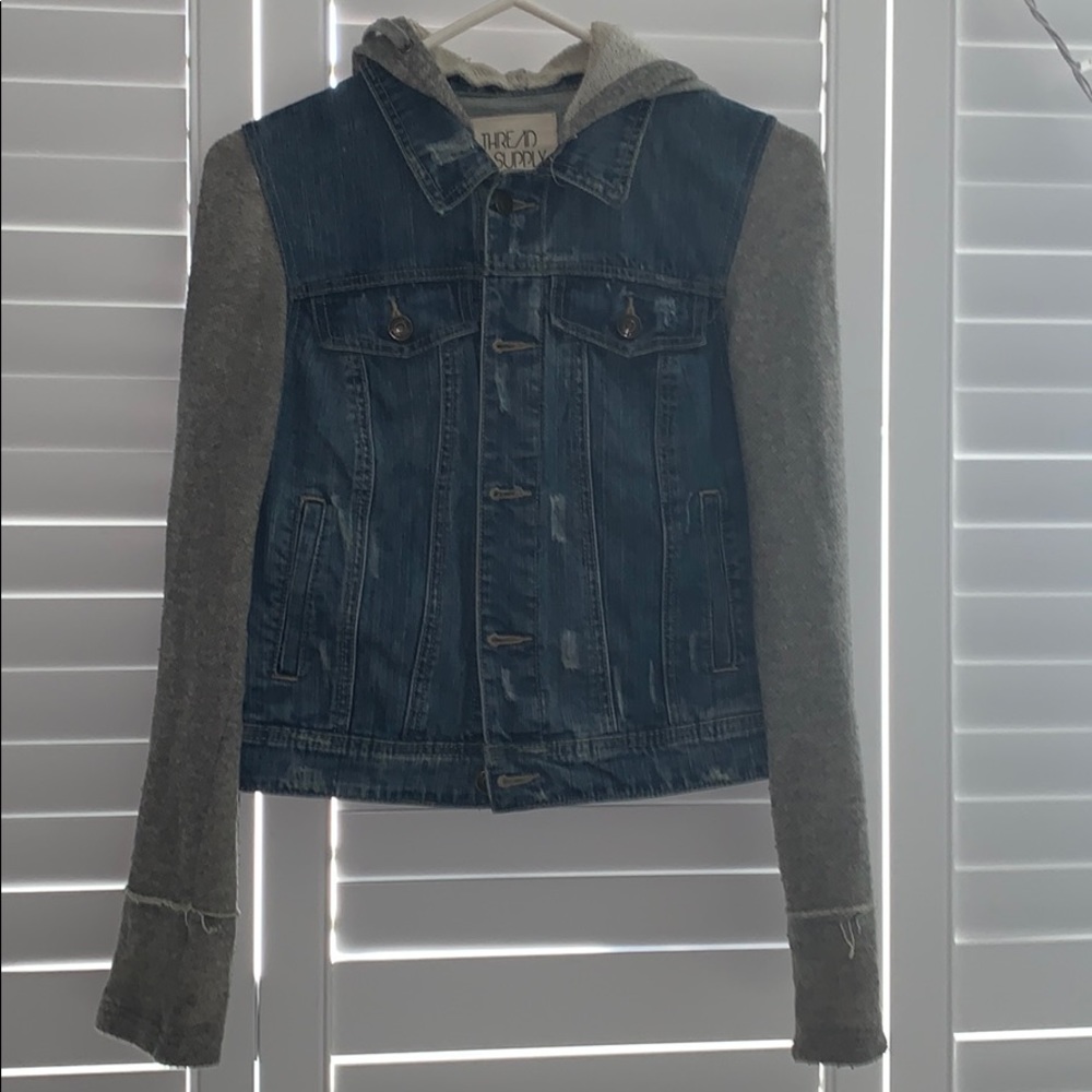 a hooded jean jacket